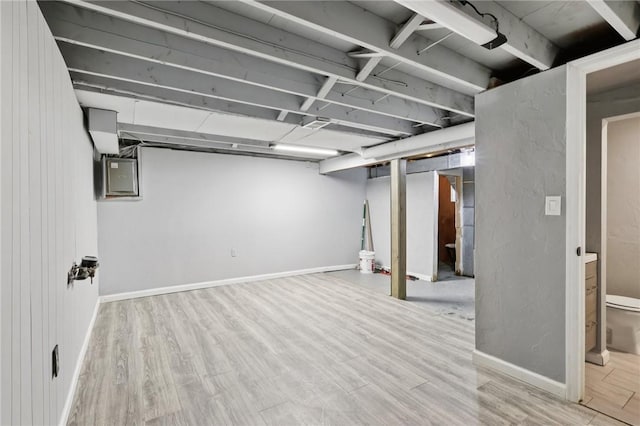 330 Delaney Dr, Wilkins Twp, PA 15235 - finished below grade area featuring wood finished floors and electric panel