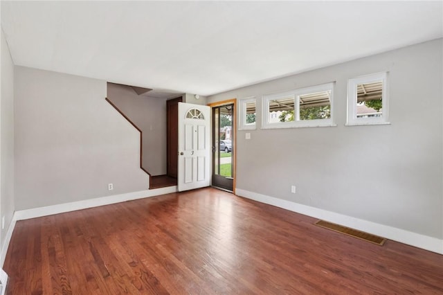 330 Delaney Dr, Wilkins Twp, PA 15235 - entryway featuring baseboards and wood finished floors