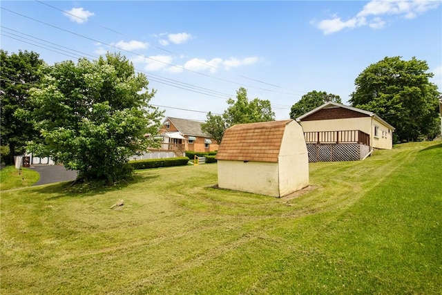 501 Bay, Stonycreek Twp, PA 15902 - view of grassy yard featuring a storage unit and a wooden deck