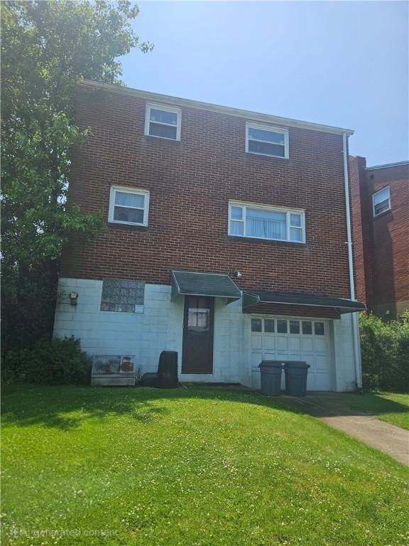 4717 Coleridge St, Stanton Heights, PA 15201 - view of front of property with an attached garage, a front lawn, brick siding, and driveway