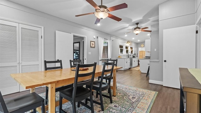 1451 Keystone St, Natrona Hts/Harrison Twp, PA 15065 - dining room with ceiling fan, dark wood-type flooring, crown molding, and recessed lighting