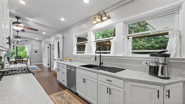 1451 Keystone St, Natrona Hts/Harrison Twp, PA 15065 - kitchen with dishwasher, vaulted ceiling, white cabinetry, decorative backsplash, and a ceiling fan