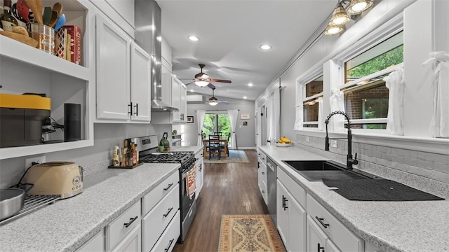 1451 Keystone St, Natrona Hts/Harrison Twp, PA 15065 - kitchen with stainless steel range with gas cooktop, white cabinets, ceiling fan, healthy amount of natural light, and recessed lighting