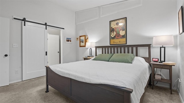 1451 Keystone St, Natrona Hts/Harrison Twp, PA 15065 - bedroom featuring a barn door and carpet flooring