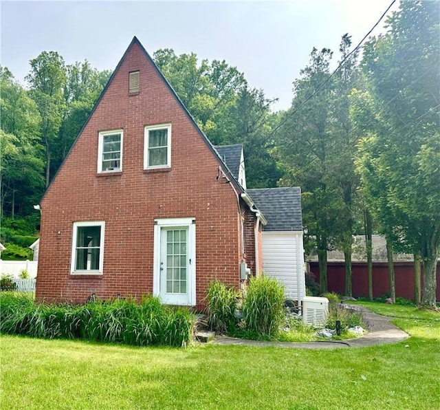 150 Lick Hollow Rd, South Union Twp, PA 15445 - rear view of house featuring brick siding and a shingled roof