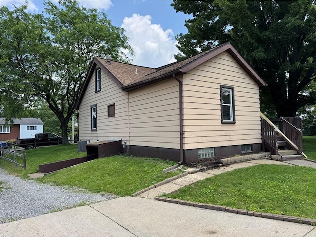 3112 Ridge Ave, Hopewell Twp Bea, PA 15001 - view of property exterior with a yard and roof with shingles