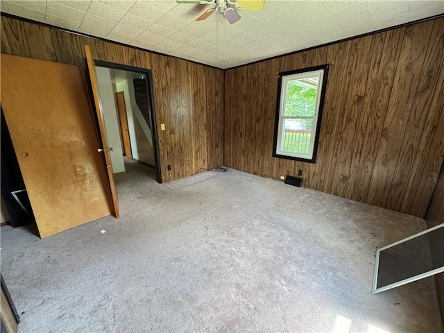 3112 Ridge Ave, Hopewell Twp Bea, PA 15001 - unfurnished room featuring wooden walls, carpet floors, and a ceiling fan