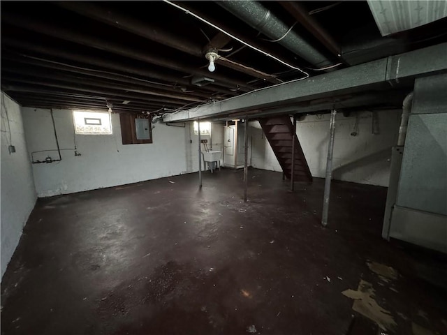 3112 Ridge Ave, Hopewell Twp Bea, PA 15001 - below grade area with electric panel, heating unit, and stairs