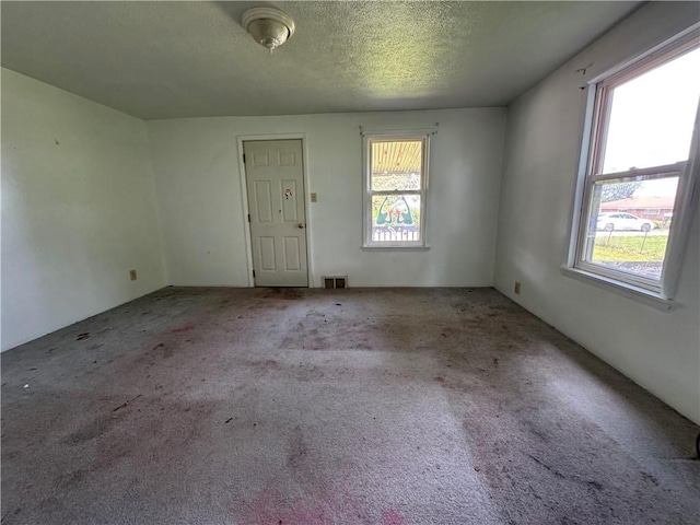 3112 Ridge Ave, Hopewell Twp Bea, PA 15001 - carpeted empty room with a textured ceiling