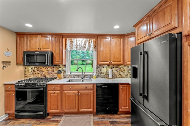 295 Sugar Cp, Peters Twp, PA 15367 - kitchen with black appliances, light countertops, dark wood-style flooring, tasteful backsplash, and recessed lighting