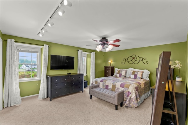 295 Sugar Cp, Peters Twp, PA 15367 - carpeted bedroom with rail lighting and a ceiling fan
