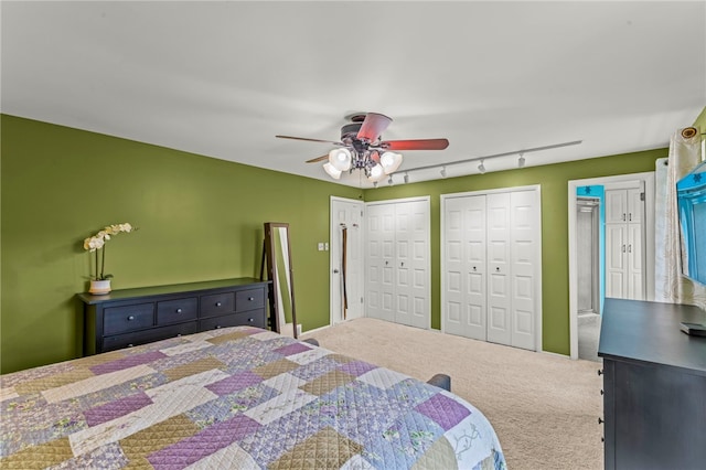 295 Sugar Cp, Peters Twp, PA 15367 - carpeted bedroom featuring multiple closets and a ceiling fan