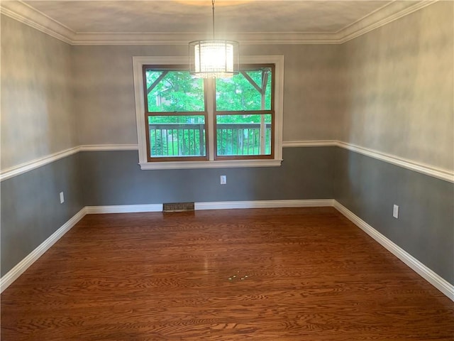 306 Marigold Dr, Unity Twp, PA 15601 - empty room featuring wood finished floors and a chandelier