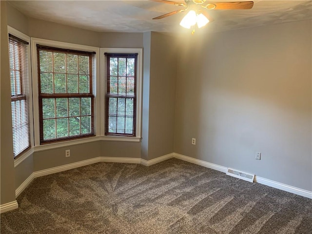 306 Marigold Dr, Unity Twp, PA 15601 - carpeted spare room featuring baseboards and ceiling fan