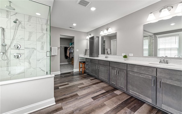 1191 Brook View Ct, Mccandless, PA 15237 - full bath with a shower stall, double vanity, wood finished floors, a spacious closet, and recessed lighting