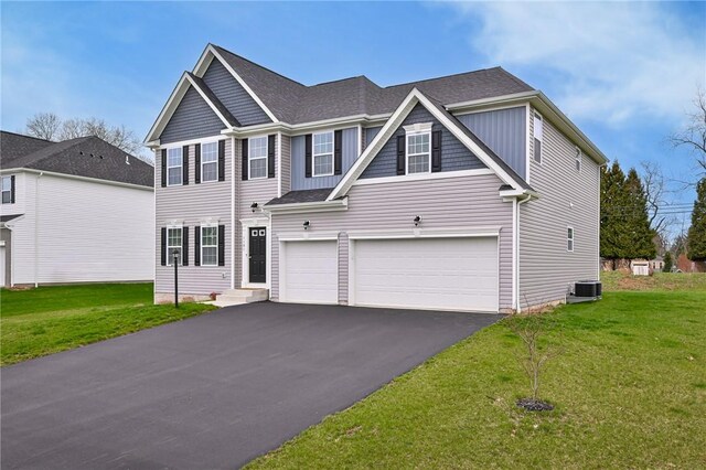 1191 Brook View Ct, Mccandless, PA 15237 - view of front of house featuring a garage, driveway, and a front yard
