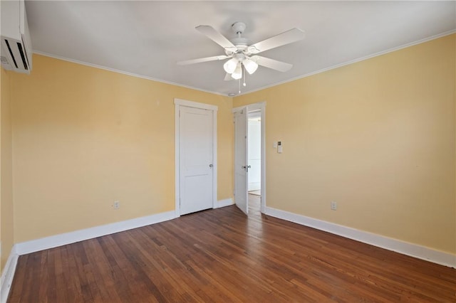 3485 Beechwood Blvd, Greenfield, PA 15217 - spare room featuring an AC wall unit, dark wood-style flooring, ceiling fan, and crown molding