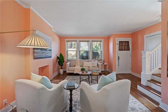 3485 Beechwood Blvd, Greenfield, PA 15217 - living area featuring wood finished floors, crown molding, and stairway