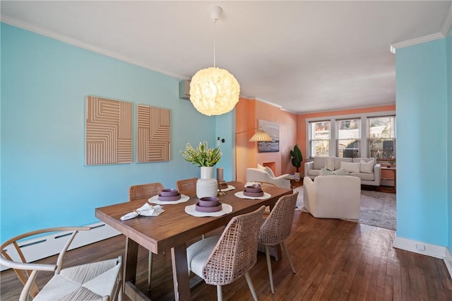 3485 Beechwood Blvd, Greenfield, PA 15217 - dining room with a baseboard radiator, ornamental molding, hardwood / wood-style flooring, and a chandelier
