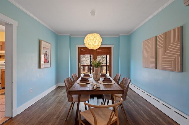 3485 Beechwood Blvd, Greenfield, PA 15217 - dining room with a baseboard radiator, wood finished floors, a chandelier, and ornamental molding