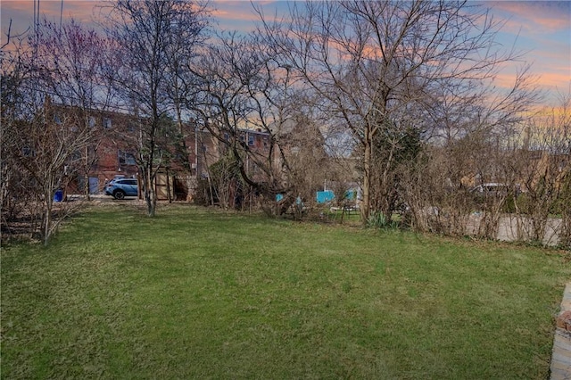 3485 Beechwood Blvd, Greenfield, PA 15217 - yard at dusk featuring a lawn