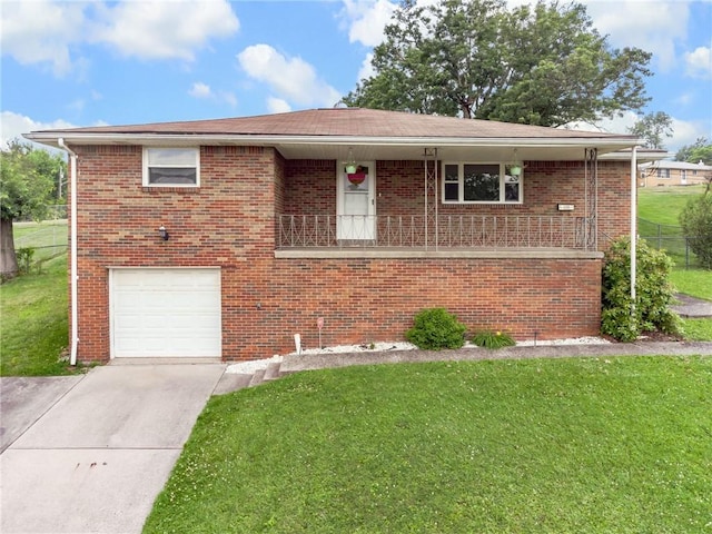 4100 Burnsire Dr, Hempfield Twp Wml, PA 15642 - view of front of house featuring a front lawn, an attached garage, driveway, and brick siding