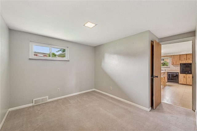 4100 Burnsire Dr, Hempfield Twp Wml, PA 15642 - spare room featuring light carpet and baseboards