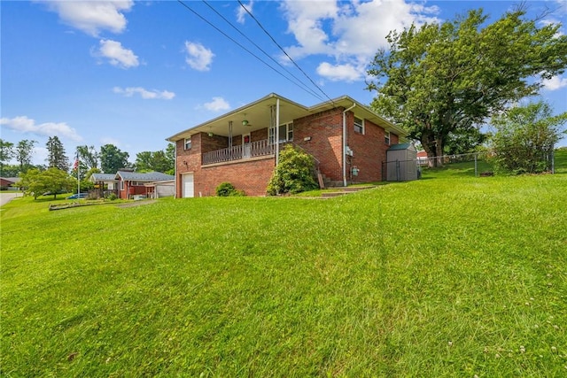 4100 Burnsire Dr, Hempfield Twp Wml, PA 15642 - rear view of property with brick siding and an attached garage