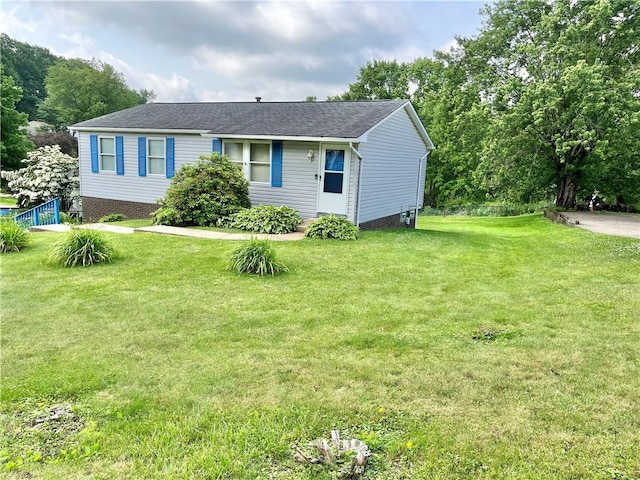 1974 Tara Dr, North Huntingdon, PA 15642 - view of front of home featuring a front lawn and roof with shingles