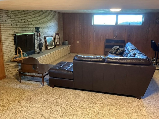 143 Herbst Rd, Kennedy Twp, PA 15108 - living room featuring wood walls and a fireplace