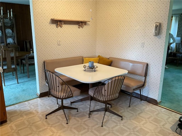143 Herbst Rd, Kennedy Twp, PA 15108 - dining space featuring breakfast area, tile patterned floors, and wallpapered walls