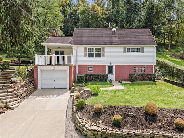737 Spring Grove Rd, Ohara, PA 15215 - view of front of property with a chimney, driveway, a front lawn, brick siding, and an attached garage
