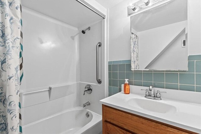 737 Spring Grove Rd, Ohara, PA 15215 - full bath featuring shower / bath combination with curtain, vanity, tile walls, and wainscoting