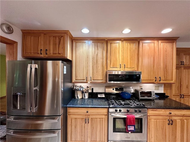 315 Lake Dr, Neshannock Twp, PA 16105 - kitchen featuring stainless steel appliances, dark stone countertops, and recessed lighting