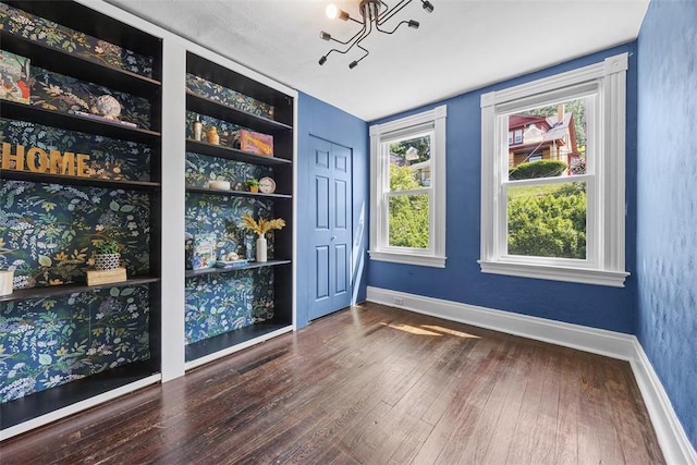 12 Township Rd, West View, PA 15229 - spare room with wood finished floors and a chandelier