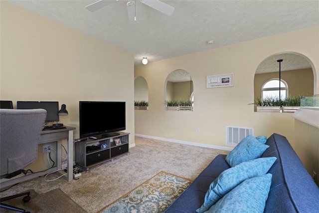 23 Sunset Ct, Cranberry Twp, PA 16066 - carpeted living area with a ceiling fan and baseboards