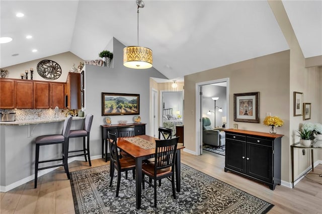 1041 Clerkenwell Ln, Cranberry Twp, PA 16066 - dining area featuring light wood-style floors and high vaulted ceiling