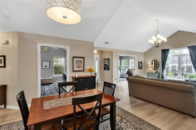 1041 Clerkenwell Ln, Cranberry Twp, PA 16066 - dining space with light wood-type flooring, plenty of natural light, a chandelier, and lofted ceiling