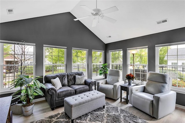 1041 Clerkenwell Ln, Cranberry Twp, PA 16066 - sunroom with high vaulted ceiling and wood finished floors