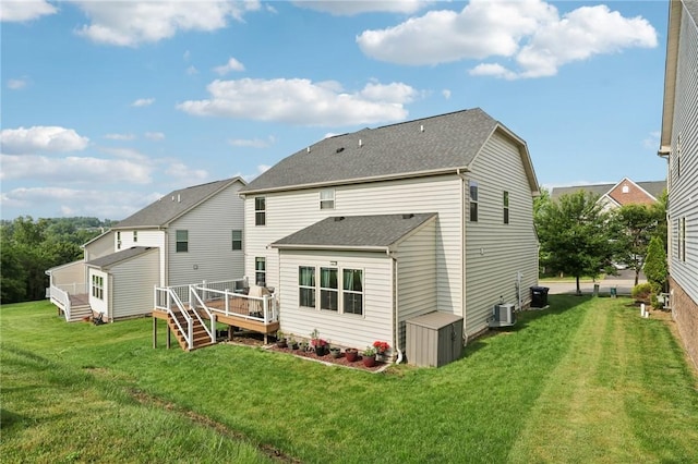 2811 De Paul Ct, Franklin Park, PA 15143 - back of house with a wooden deck, a lawn, and a shingled roof