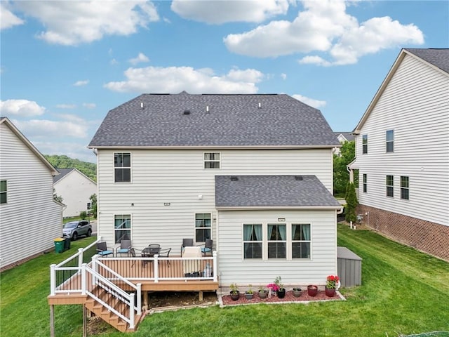 2811 De Paul Ct, Franklin Park, PA 15143 - back of property featuring roof with shingles, a wooden deck, and a lawn