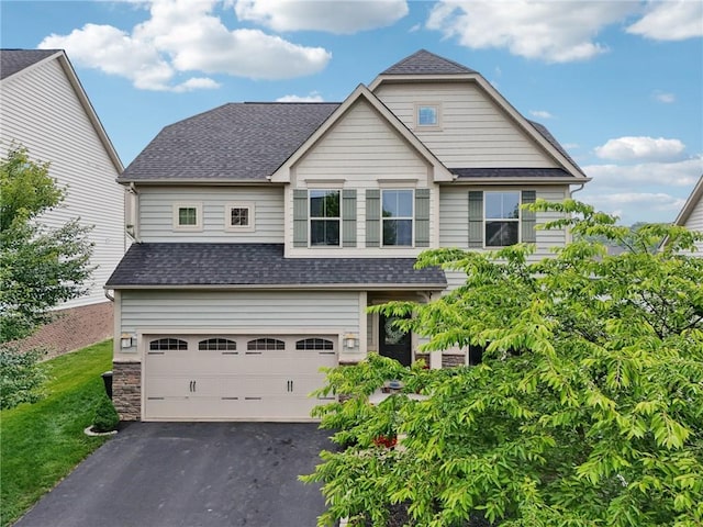 2811 De Paul Ct, Franklin Park, PA 15143 - traditional-style house featuring a garage, roof with shingles, and asphalt driveway