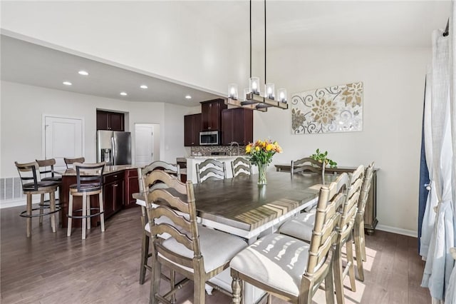 2811 De Paul Ct, Franklin Park, PA 15143 - dining area with dark wood finished floors, recessed lighting, a chandelier, and high vaulted ceiling