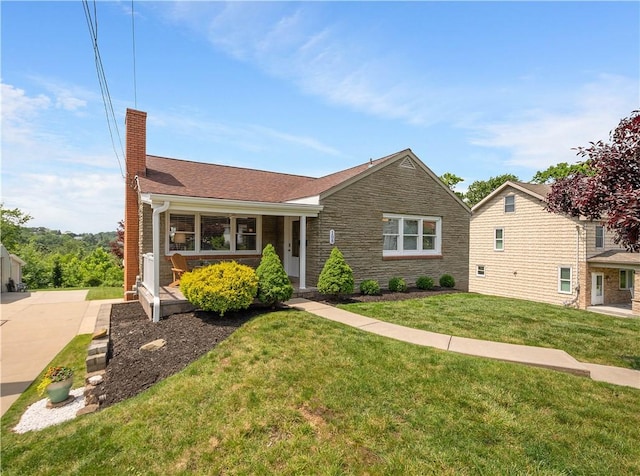 108 Mary St, Ross Twp, PA 15214 - view of front of property with a chimney, covered porch, and a front lawn
