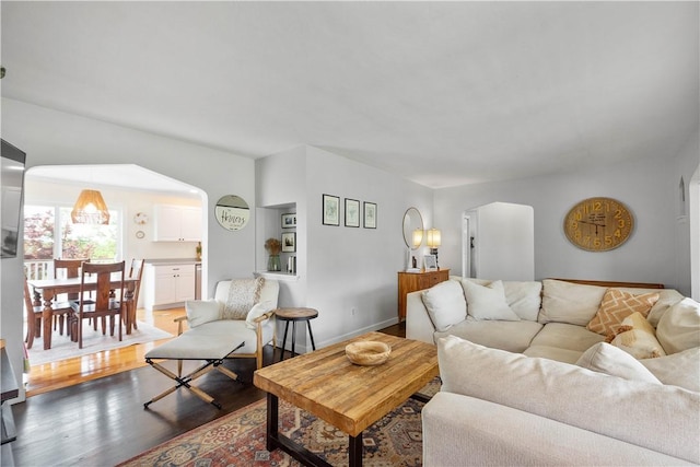 108 Mary St, Ross Twp, PA 15214 - living area featuring wood finished floors and arched walkways