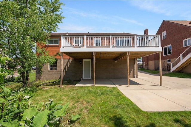 108 Mary St, Ross Twp, PA 15214 - rear view of property with a deck, a patio area, and a lawn