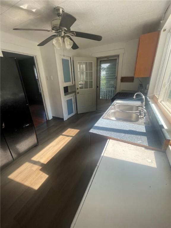 1354 Water St, Indiana Boro Ind, PA 15701 - kitchen with freestanding refrigerator, ceiling fan, dark wood finished floors, and brown cabinetry