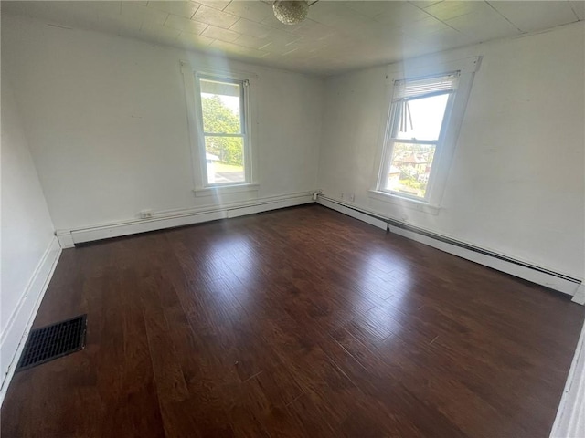 1354 Water St, Indiana Boro Ind, PA 15701 - spare room featuring plenty of natural light, dark wood-type flooring, and a baseboard heating unit