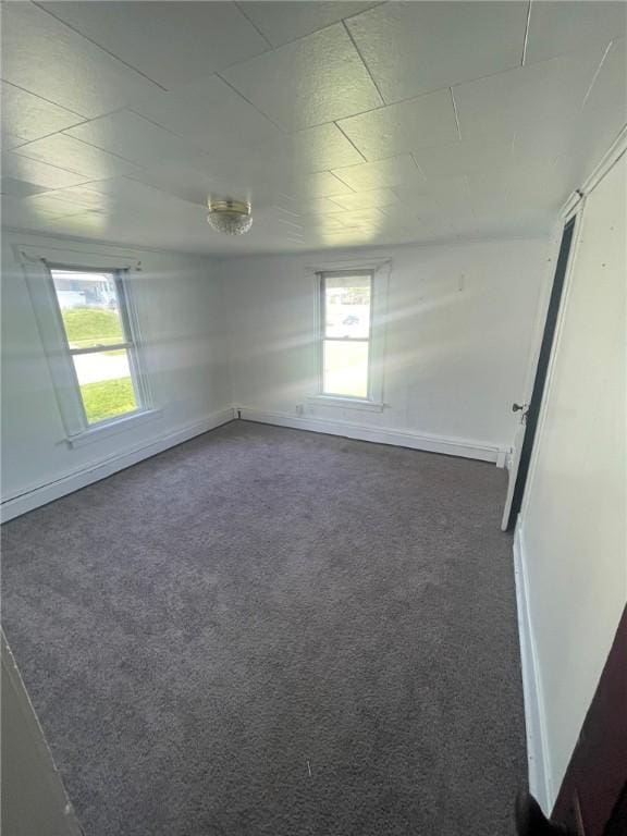 1354 Water St, Indiana Boro Ind, PA 15701 - spare room featuring dark carpet and healthy amount of natural light