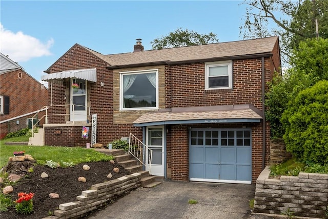 237 Creston, West Mifflin, PA 15122 - view of front of home featuring brick siding, a chimney, an attached garage, and asphalt driveway
